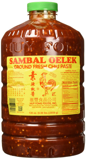 Huy Fong Sambal Oelek jar closeup shows fresh chili paste ready to stir.