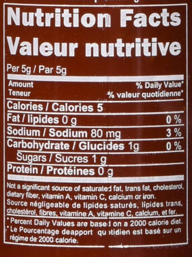 Huy Fong Sriracha bottle back view showing label details and gluten-free vinegar and kosher notes.