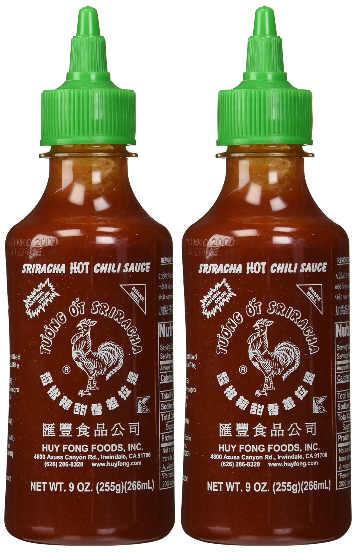 Huy Fong Sriracha bottle pour adds bold heat and versatile flavor to soups, pizzas, and burgers.