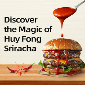 Pour stream of Huy Fong Sriracha, ready to add a controlled dash of heat.