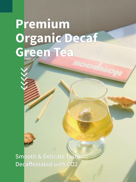 HYNTMYT green tea bags steeping cup showing smooth, refreshing flavor.