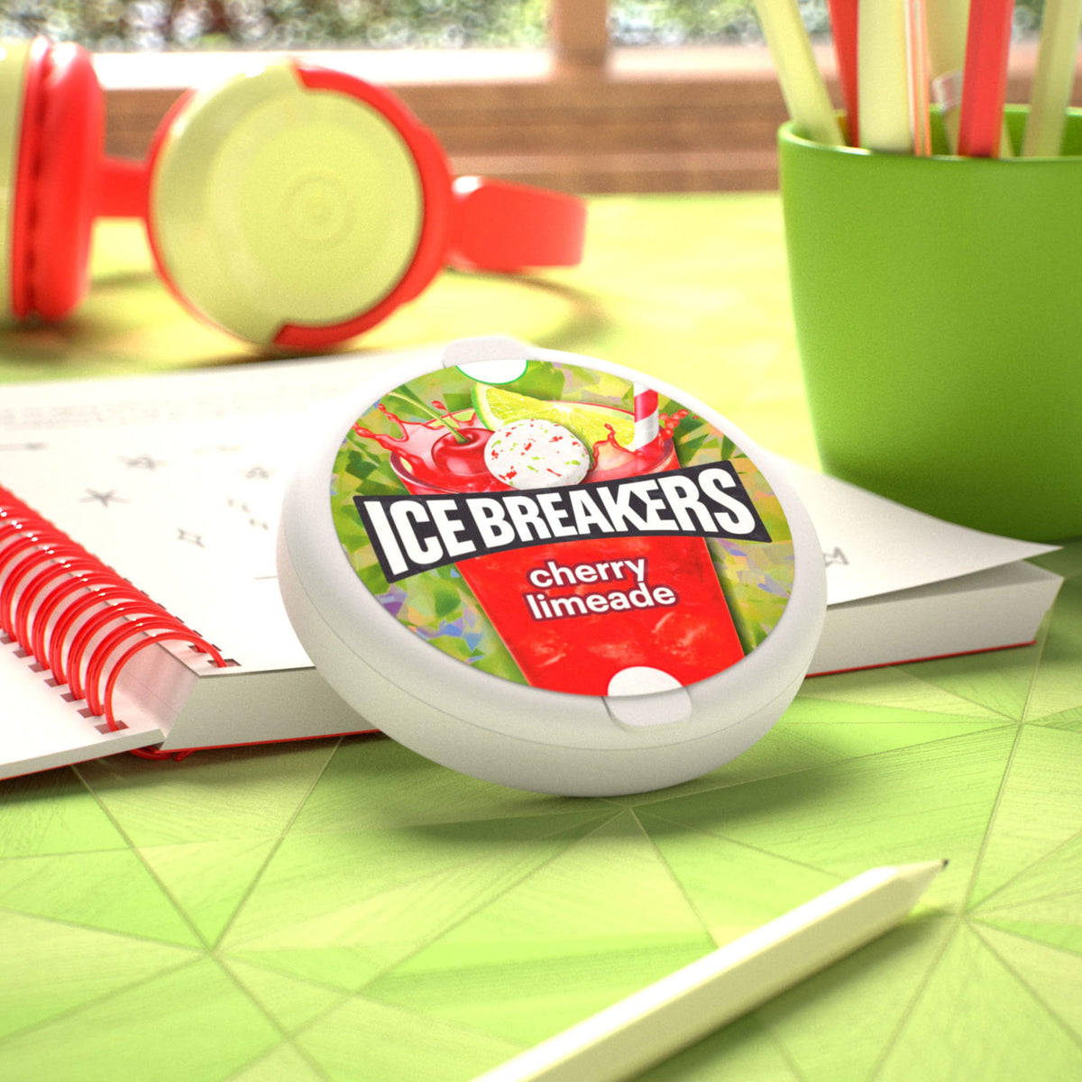 ICE BREAKERS cherry limeade mints near car keys for quick drive-time breath boosts.