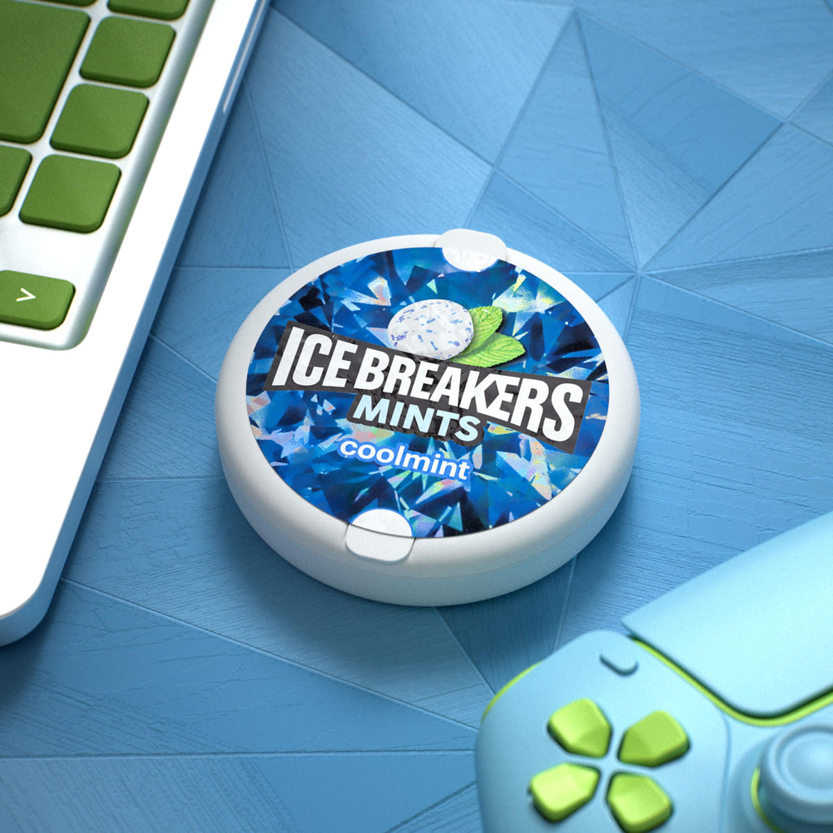 Ice Breakers Coolmint tin on a desk drawer setup for easy access
