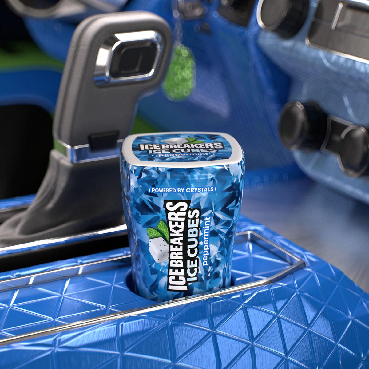 Backpack pocket containing Ice Breakers Ice Cubes for quick minty hits.
