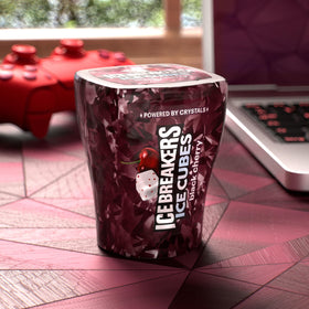 Ice Breakers Ice Cubes Black Cherry on a desk with other essentials