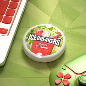 Sugar-free ICE BREAKERS mints with flavor crystals highlight cherry limeade flavor.