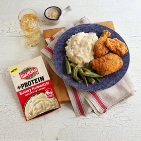 Family enjoying Idahoan Buttery Homestyle +Protein mashed potatoes as a quick side.