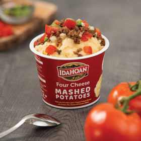 Packaging of Idahoan Four Cheese Mashed Potatoes Cups