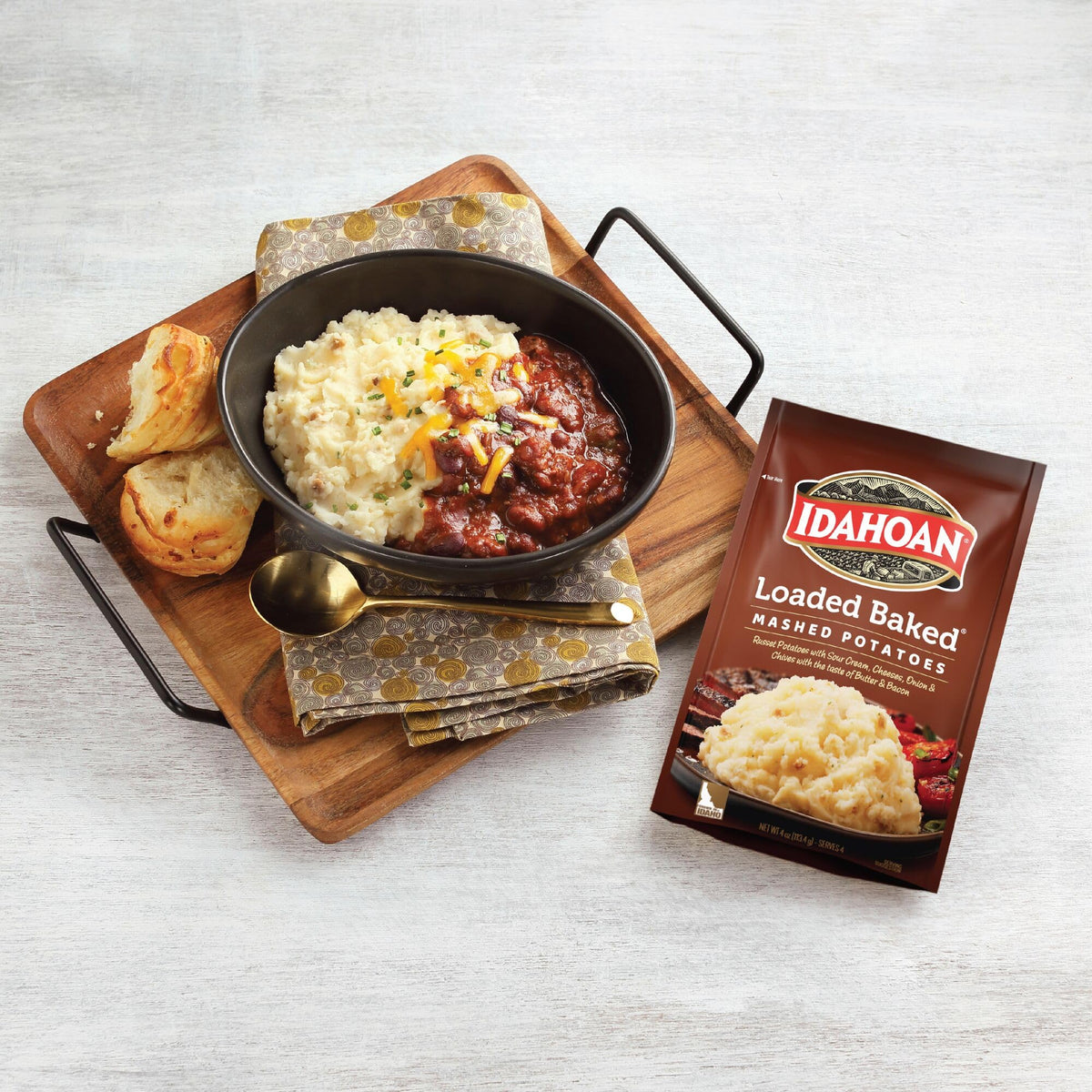 Idahoan Loaded Baked Mashed Potatoes creamy texture shown in a bowl.