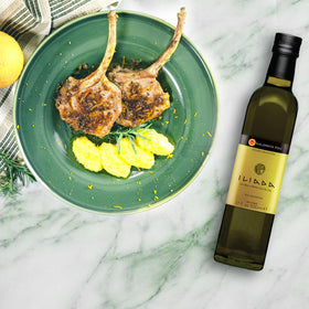 Iliada Kalamata PDO EVOO tasting plate showing green fruit notes