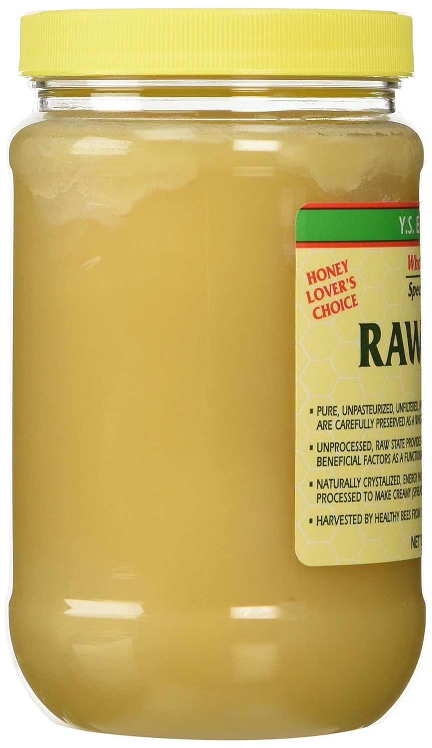 Honey being poured into tea for natural sweetness with Y.S. Eco Bee Farms