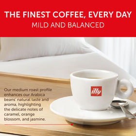 illy Classico beans close-up highlights Arabica quality for consistent, balanced flavor