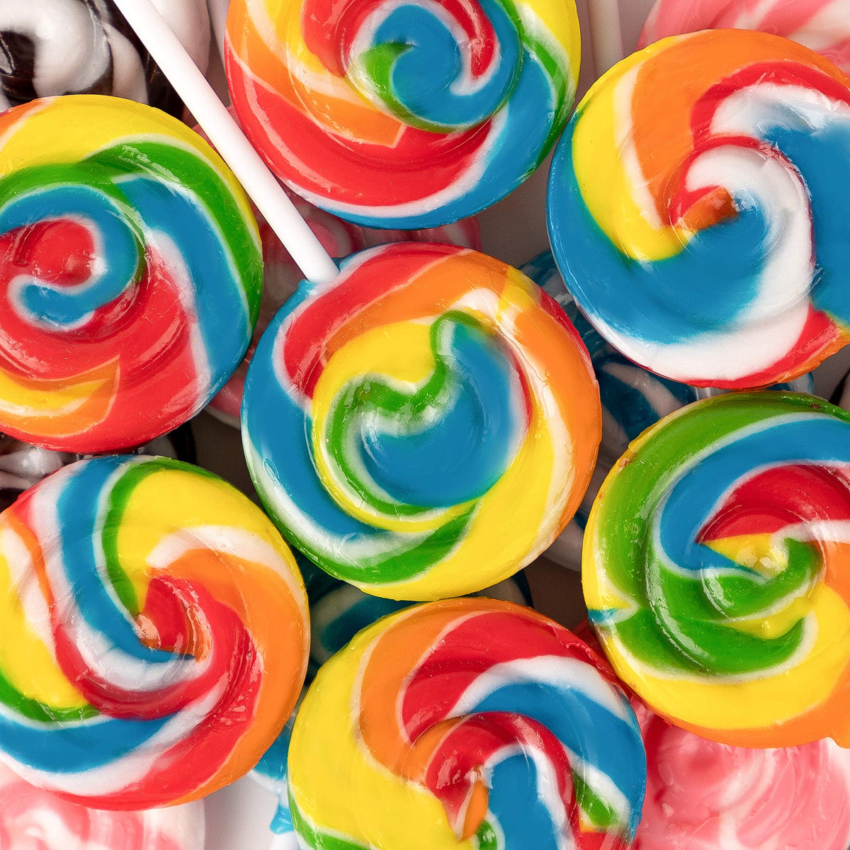 Imagine Splash Rainbow Swirl Lollipops with mixed fruit flavors for tastings.