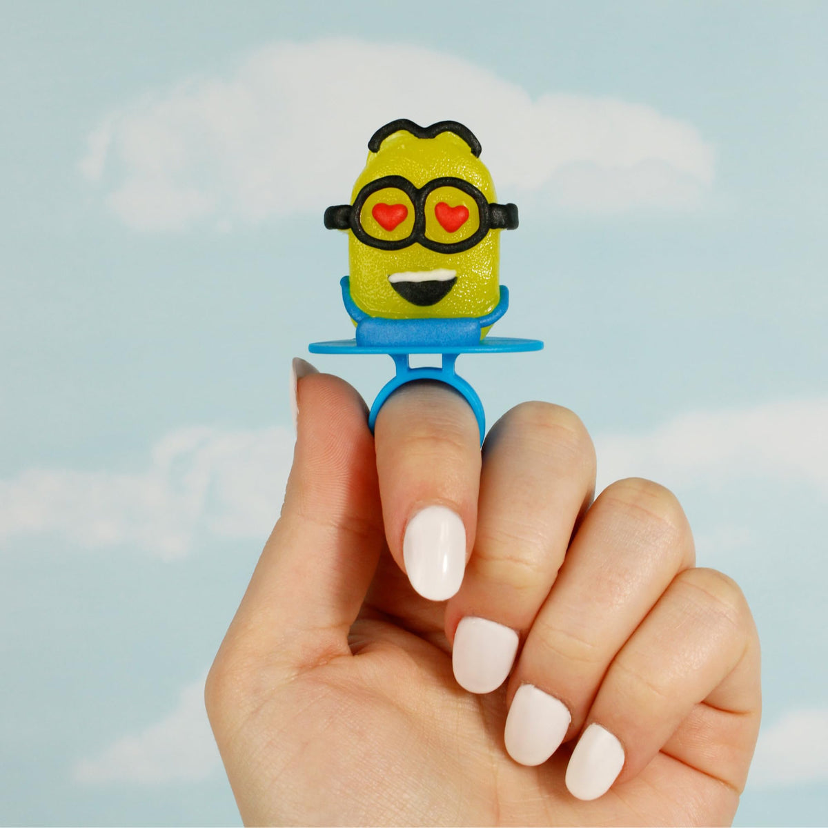 Imaginings 3 Minions lollipop ring blue raspberry delivers tangy fun for party treats.