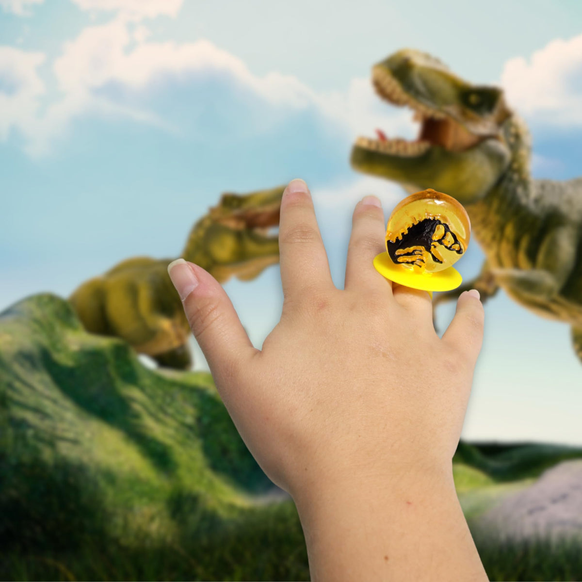 Imaginings 3 Jurassic World lollipop ring orange flavor bright snack option.