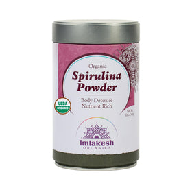 Imlak'esh Organics spirulina powder jar close-up highlighting pure nutrient-dense powder.