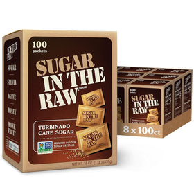 IN THE RAW sugar packets beside a steaming cup of coffee for smooth sweetness