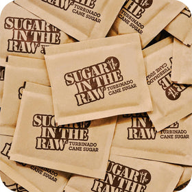 IN THE RAW Turbinado sugar packets packaging label; vegan, gluten-free, non-GMO.