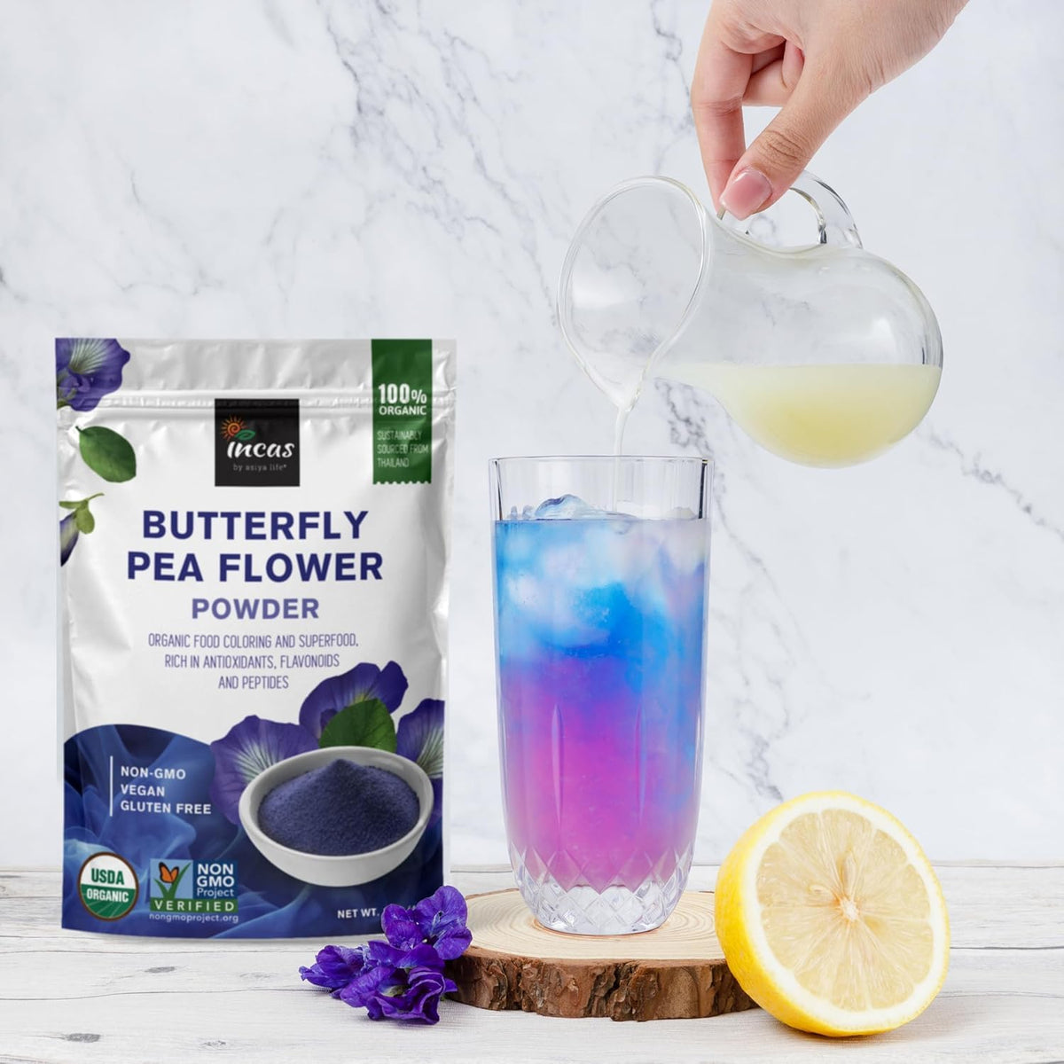 Incas by Asiya Life butterfly pea powder poured into a smoothie for color