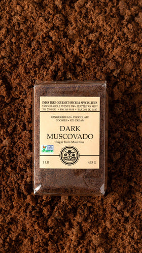 Close-up of India Tree Dark Muscovado Sugar texture showing moist crystals for baking depth.