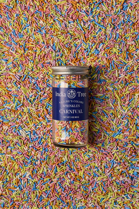 India Tree Pastel Rainbow Sprinkles in a bowl ready for high-volume decorating.