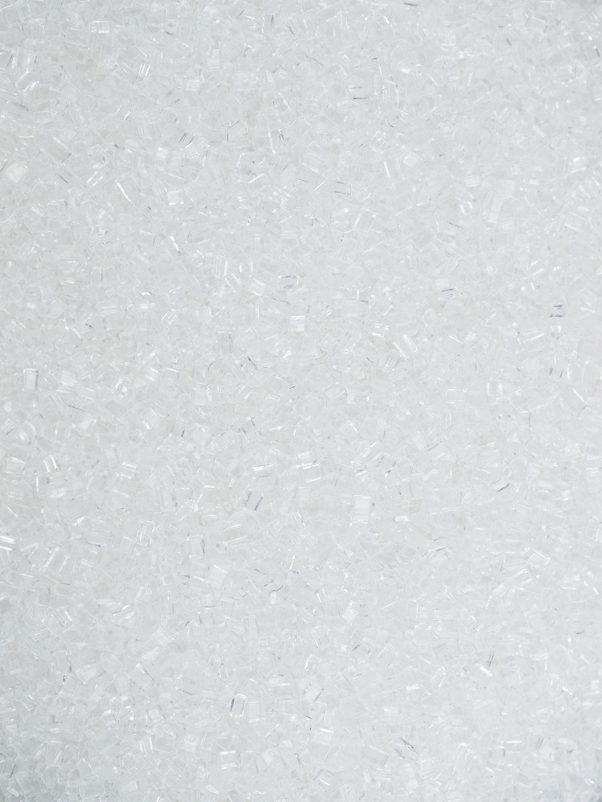 India Tree White Sparkling Sugar close-up on cookies to showcase texture and shine.