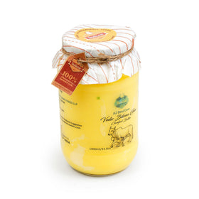 Indicow A2 Desi Sahiwal ghee jar closeup shows clarified butter texture.