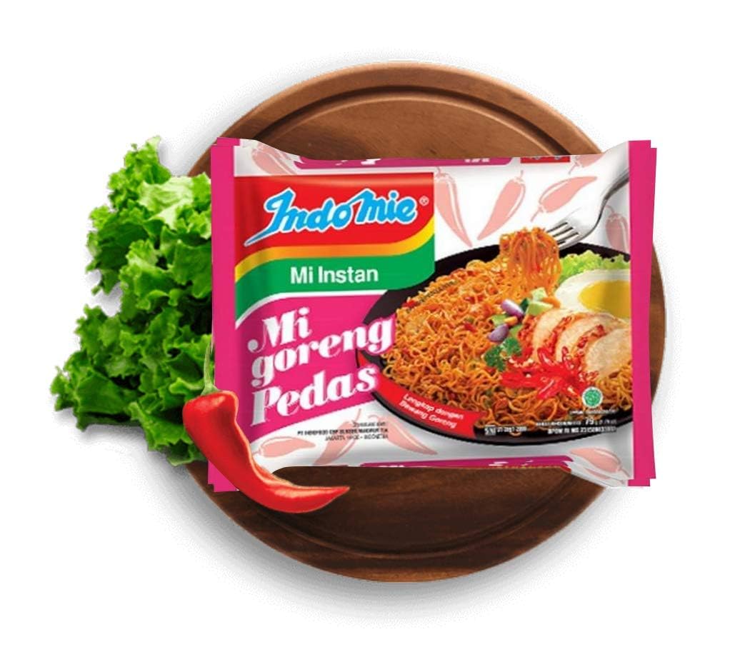 Indomie Mi Goreng packets with sauces ready for stirring