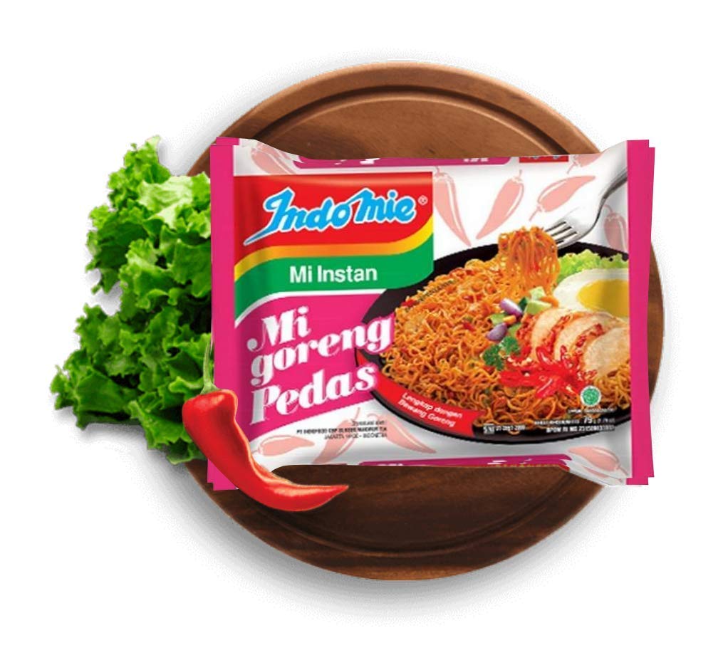 Indomie Mi Goreng seasoning sauce packets highlight rich, authentic flavor.