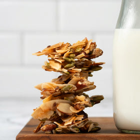 InnoFoods Organic Almond Pecan Clusters dietary certifications display USDA Organic and non-GMO.