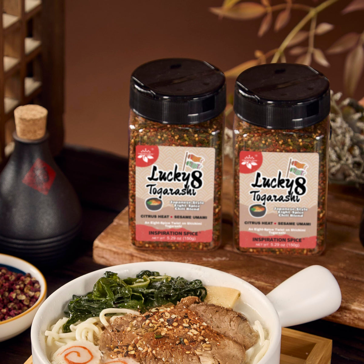 Grilled meat finished with Lucky 8 Togarashi for a citrus-savory glaze.