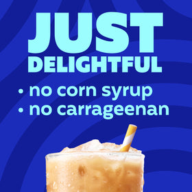 Pour shot of International Delight Cinnabon Iced Coffee showing creamy texture and aroma.
