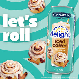 Fridge-ready cans of International Delight Cinnabon Iced Coffee displayed for quick access.