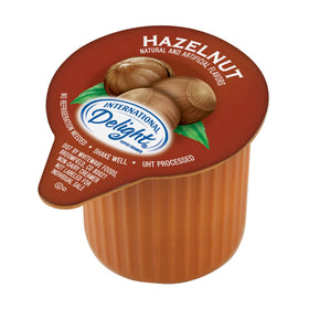 International Delight hazelnut single-serve creamer cups, 192-count, shelf-stable and convenient.
