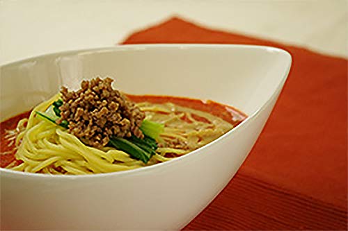 IPPINKA Japanese Black Sesame Paste dressing idea, elevating salads with sesame flavor.