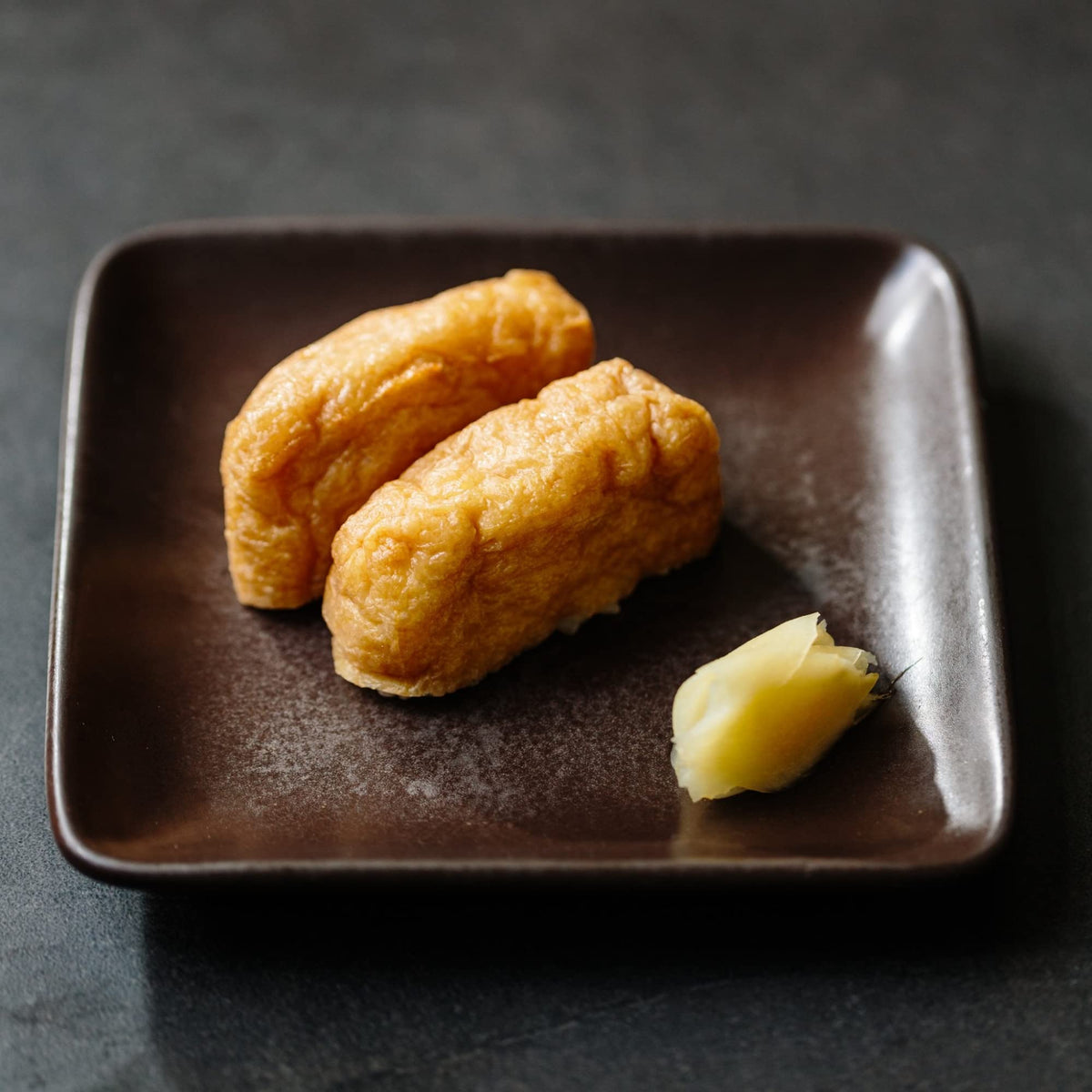 Product packaging communicates quality and traditional Okinawan heritage.