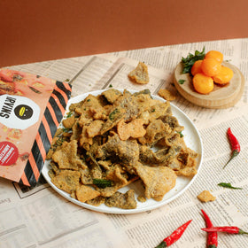 Irvins hand-cooked salmon skin chips close-up, showcasing premium texture.