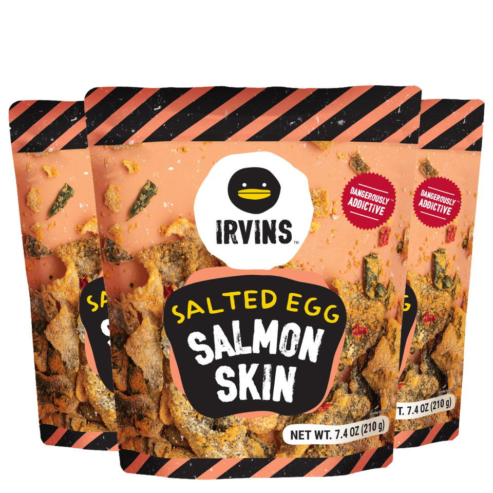Irvins front-pack view of salted egg salmon skin chips, premium snack on the go.