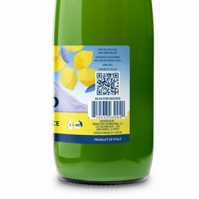 Italian Volcano Lemon Juice glass with lemon wedges for zesty recipes.