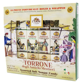 Itan Torrone almond honey piece close-up highlights chewy texture and nutty richness.