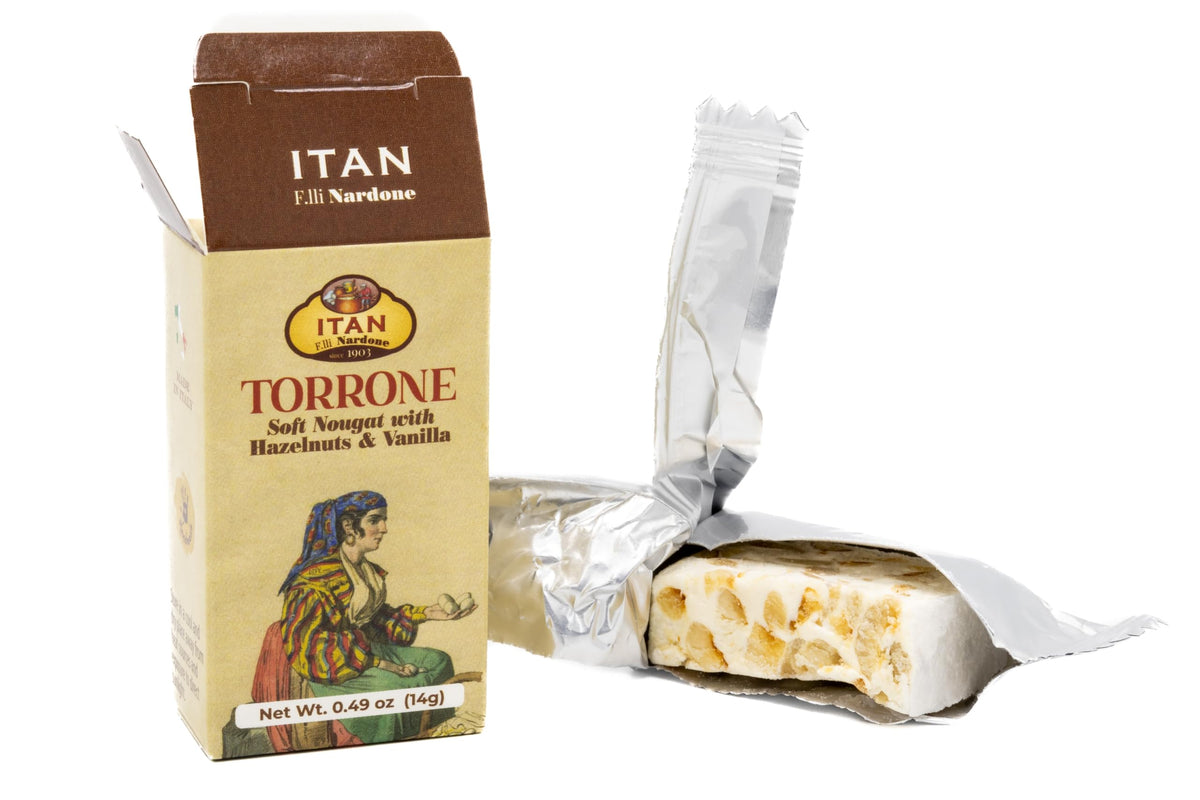 Itan Torrone almond pistachio piece close-up showcases Mediterranean balance of flavors.