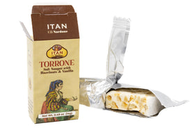 Itan Torrone almond pistachio piece close-up showcases Mediterranean balance of flavors.