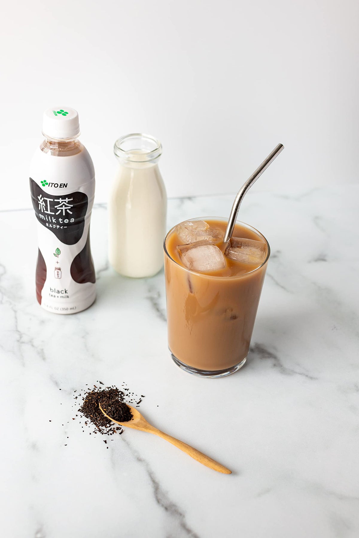 Ito En Black Milk Tea pour capturing ready-to-drink café flavor in a bottle.