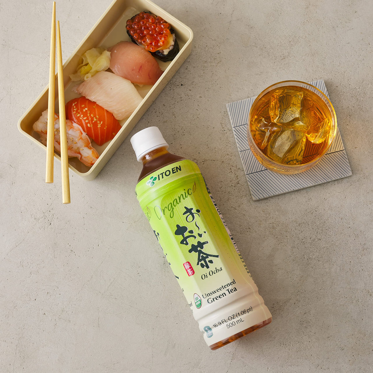 Ito En Oi Ocha unsweetened green tea bottle on the move, clean, refreshing flavor anytime.