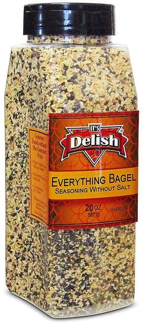 It's Delish Everything Bagel Seasoning jar close-up with sesame seeds.