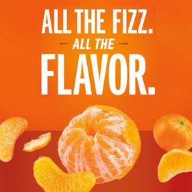 IZZE Clementine sparkling juice glass pour capturing bright bubbles and citrus aroma.