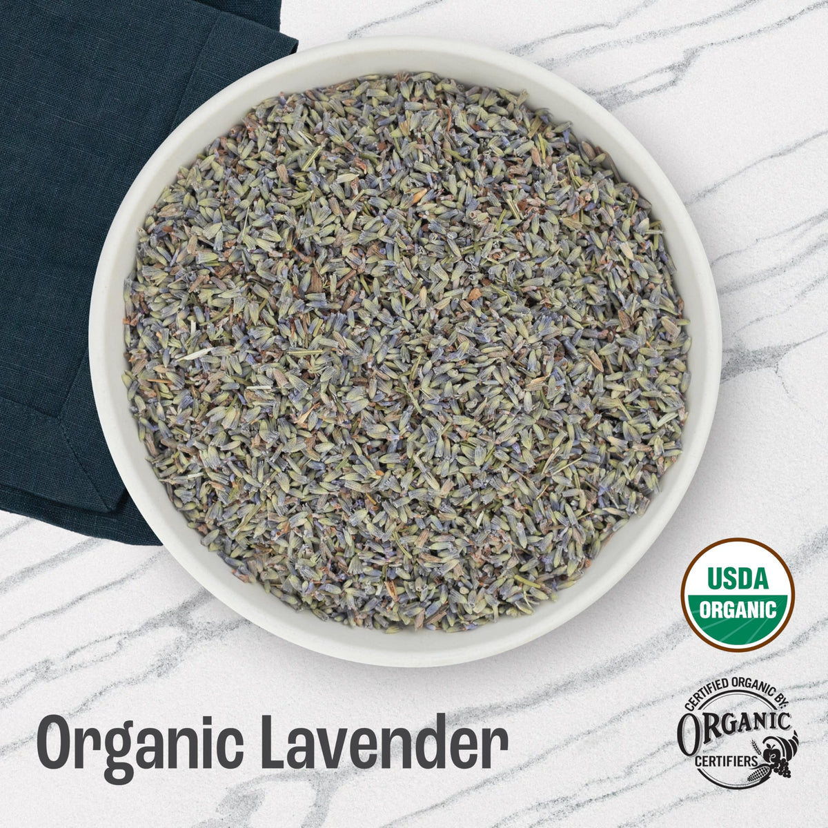 J MAC Botanicals lavender buds culinary closeup showing vibrant color perfect for tea and lemonade blends.