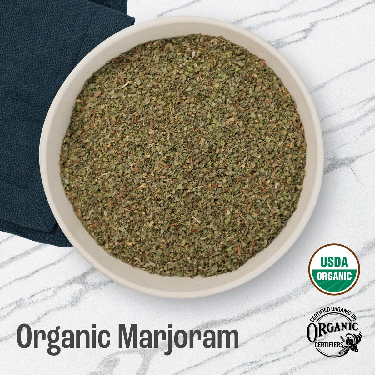 J Mac Botanicals marjoram leaves close-up highlighting fresh, aromatic quality for cooking.