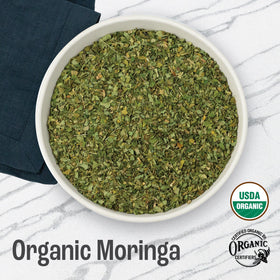 J Mac Botanicals Moringa leaf dried closeup shows vibrant leaf texture and quality.