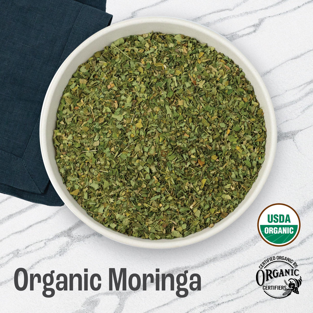 J Mac Botanicals moringa leaves in resealable pouch for fresh brewing.